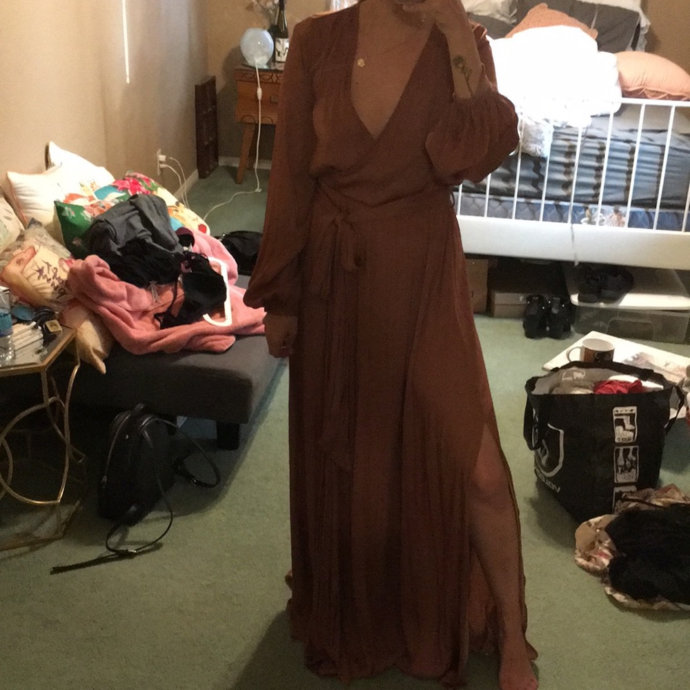 Brown maxi dress with a side slit on the right.